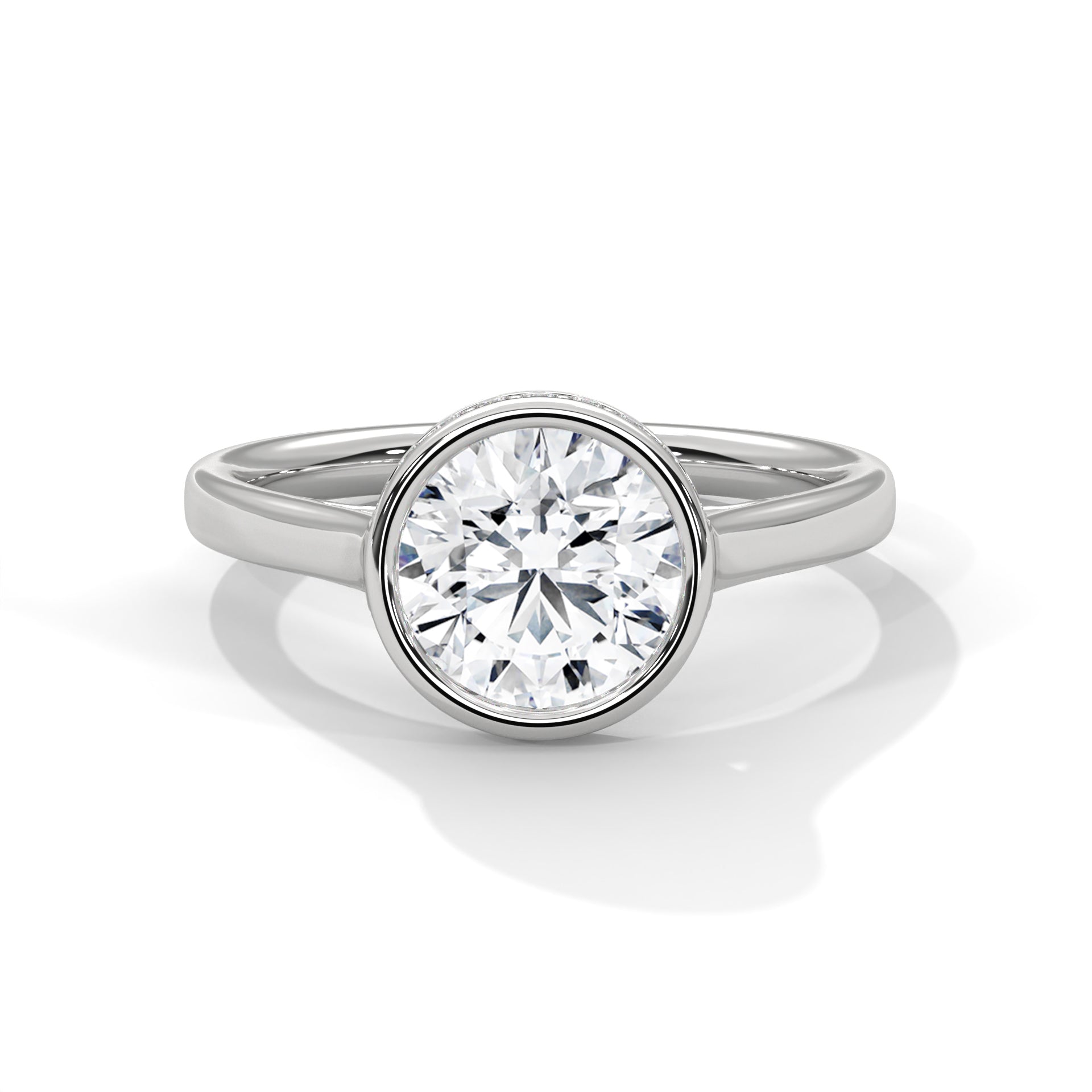 gold ring with a large diamond on a white background