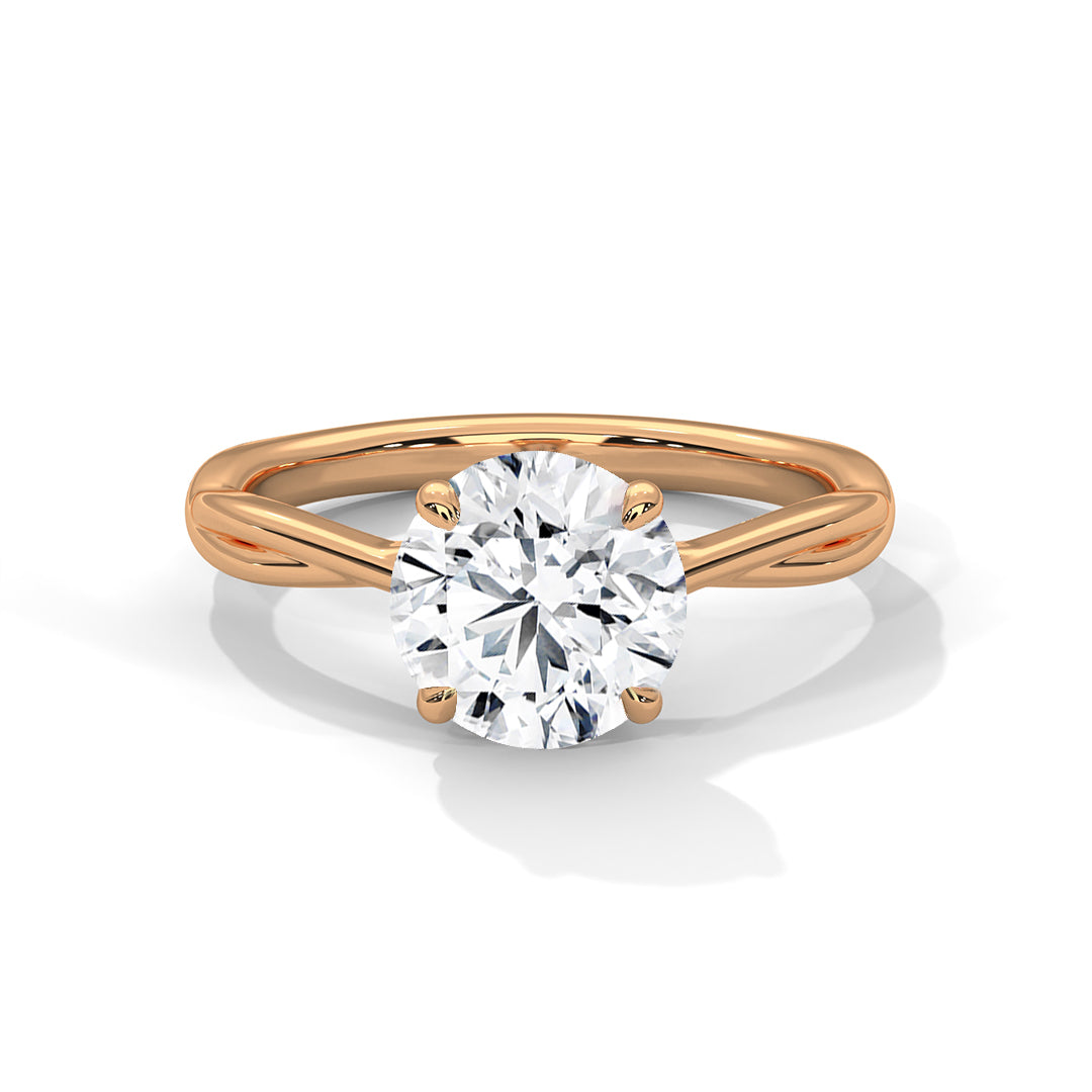 Rose gold ring with a diamond on a white background