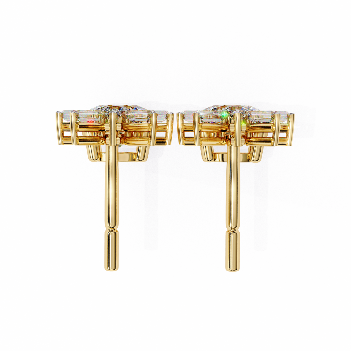 Gold earrings with gemstones on a white background