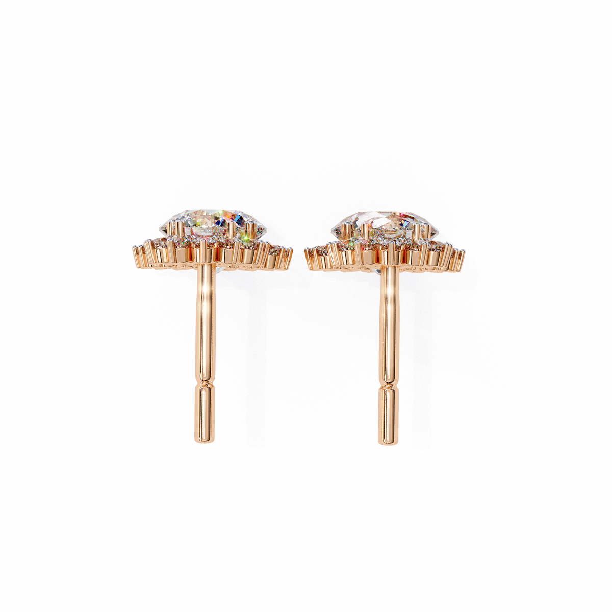 Rose gold earrings with gemstones on a white background