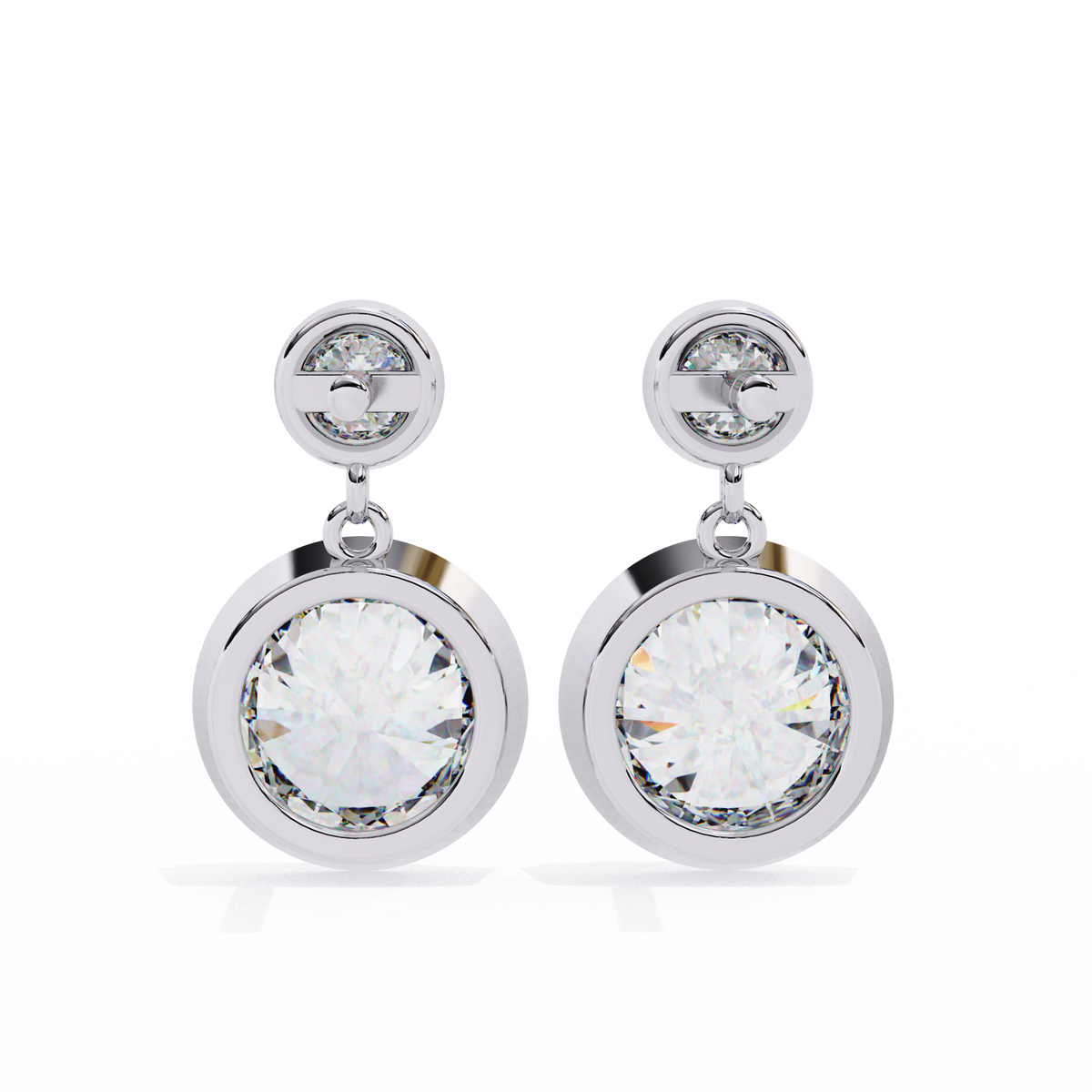 Silver earrings with large clear gemstones on a white background