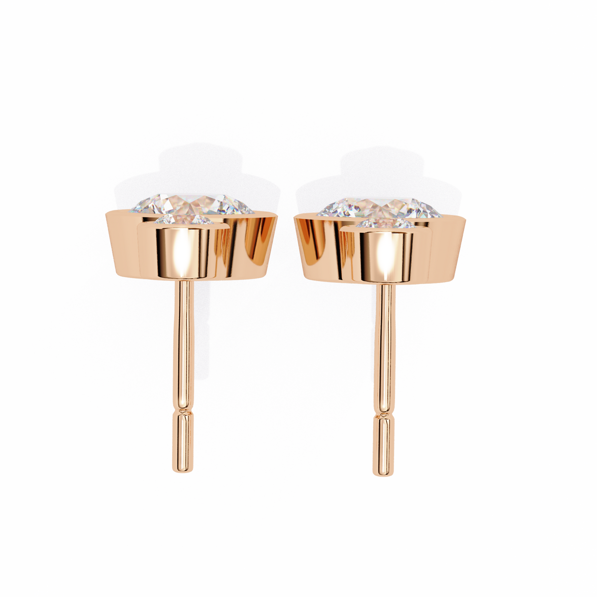 Rose gold earrings with clear gemstones on a white background