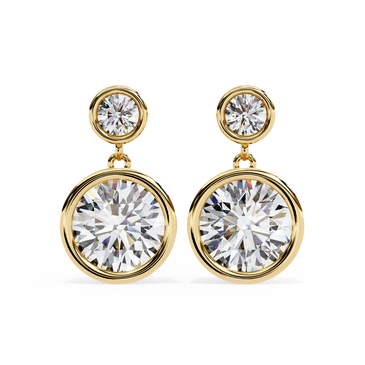 Gold earrings with large clear gemstones on a white background