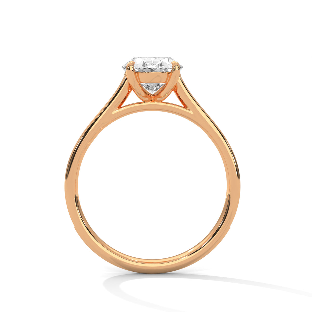 Gold ring with a diamond on a white background