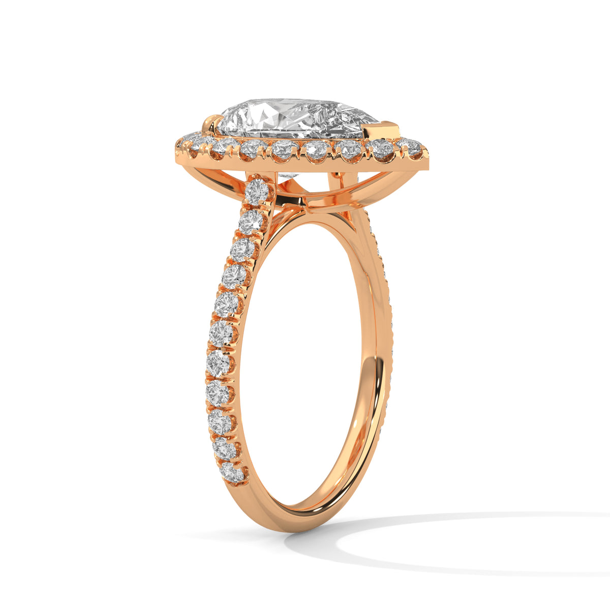 Rose gold ring with diamonds on a white background