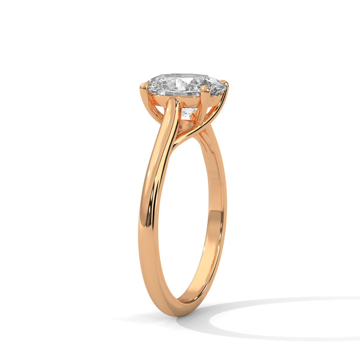 Rose gold ring with a diamond on a white background
