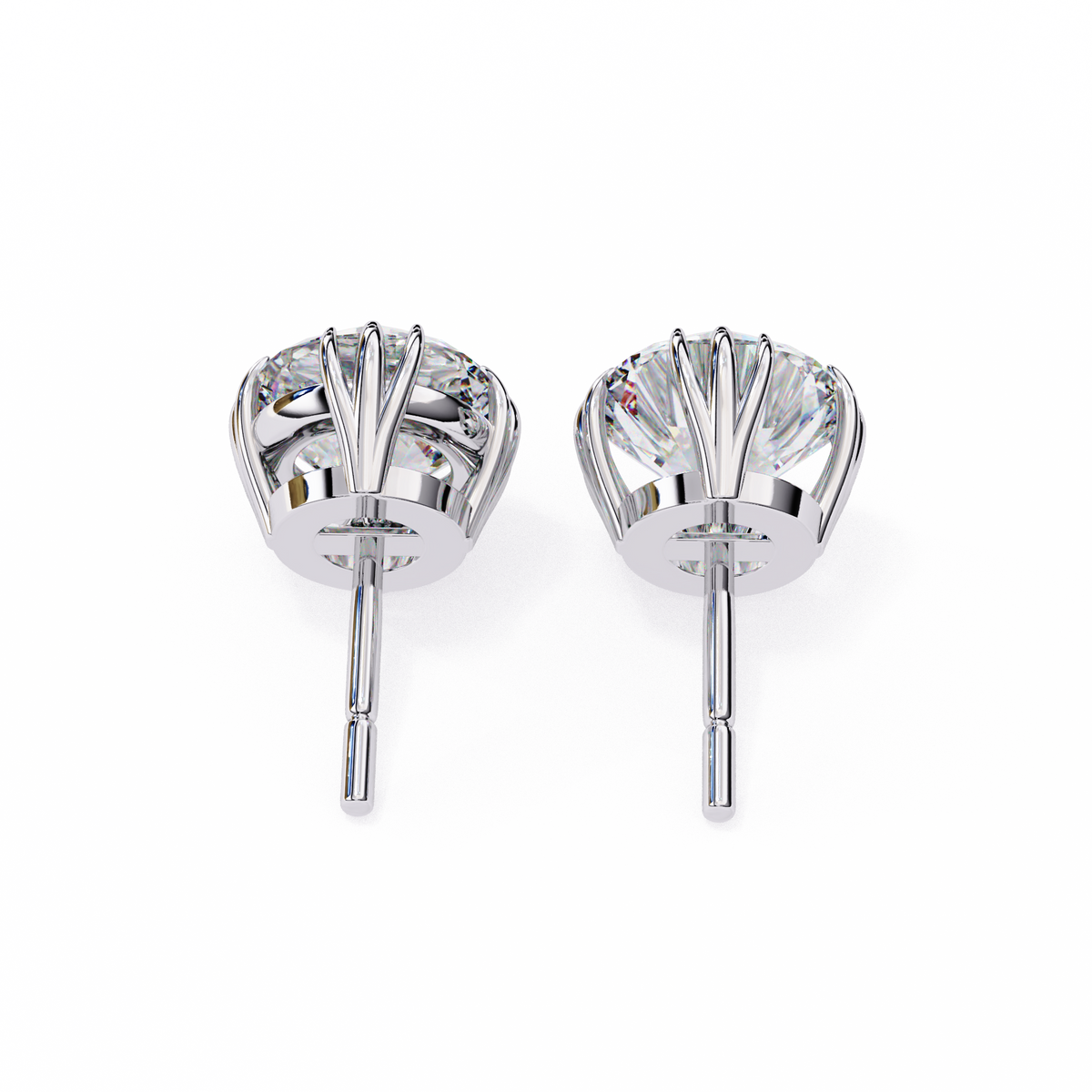 Pair of silver stud earrings with clear gemstones on a white background