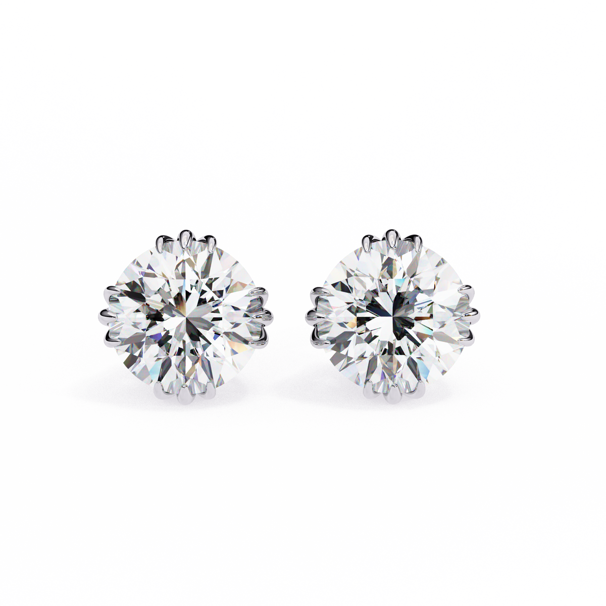 Pair of diamond stud earrings on a white background
