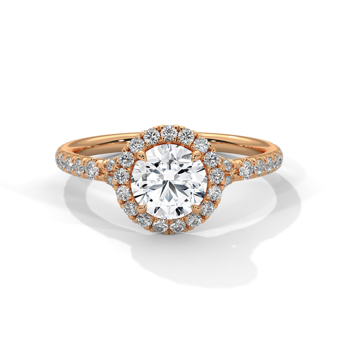 Rose gold ring with a diamond on a white background