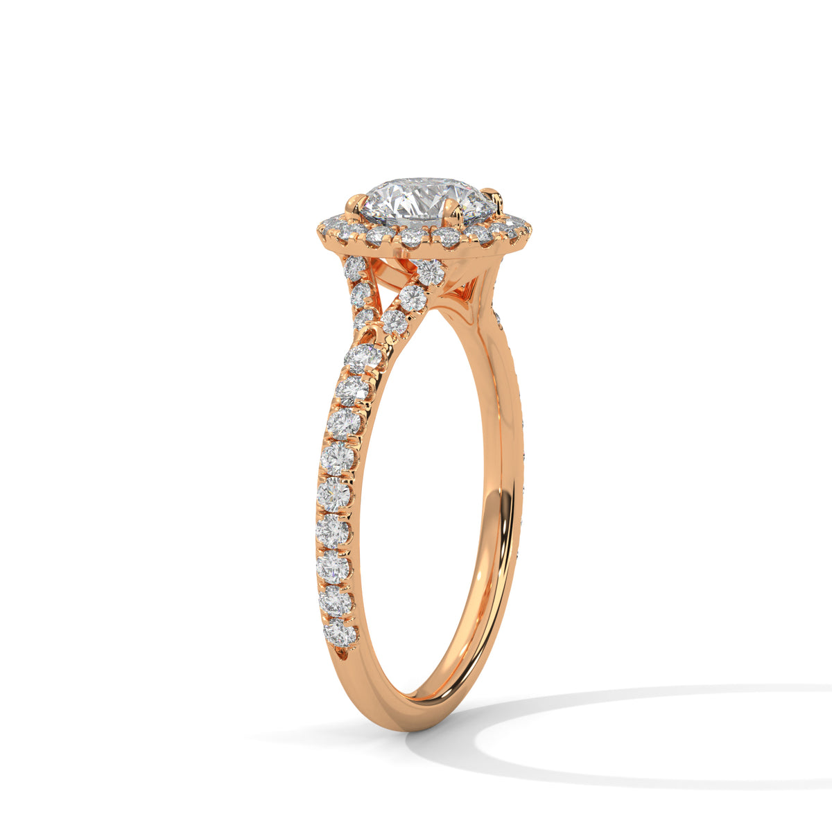 Rose gold ring with diamond accents on a white background