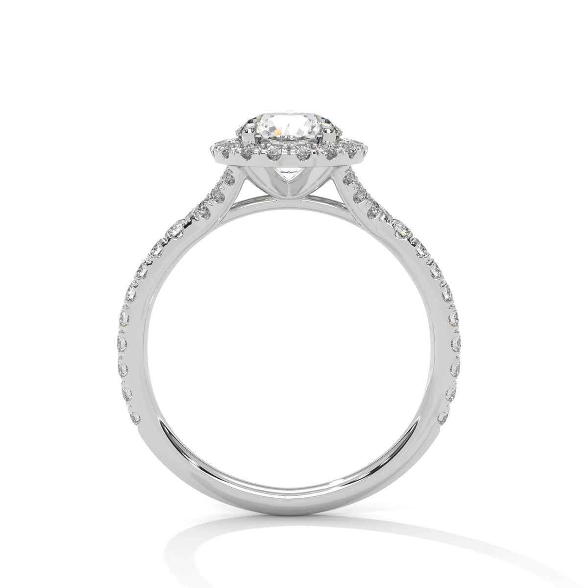 Diamond ring with a halo setting on a white background