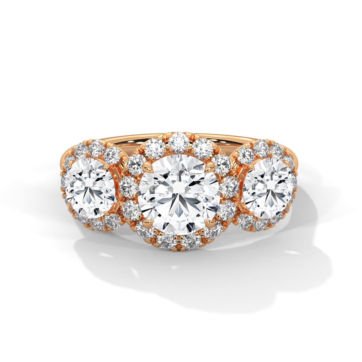 Diamond ring with rose gold band on a white background