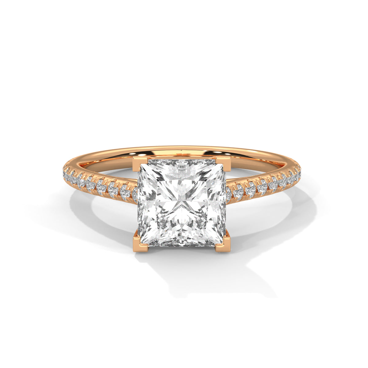 Rose gold ring with a large diamond and smaller diamonds on the band against a white background