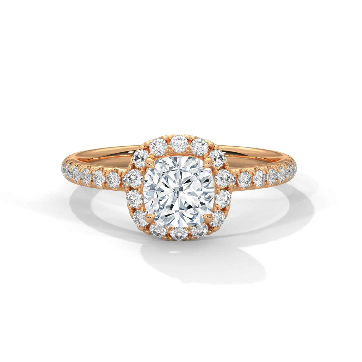 Rose gold ring with a large diamond and smaller diamonds on the band against a white background