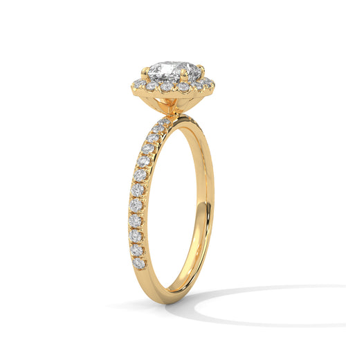 Gold ring with diamond accents on a white background