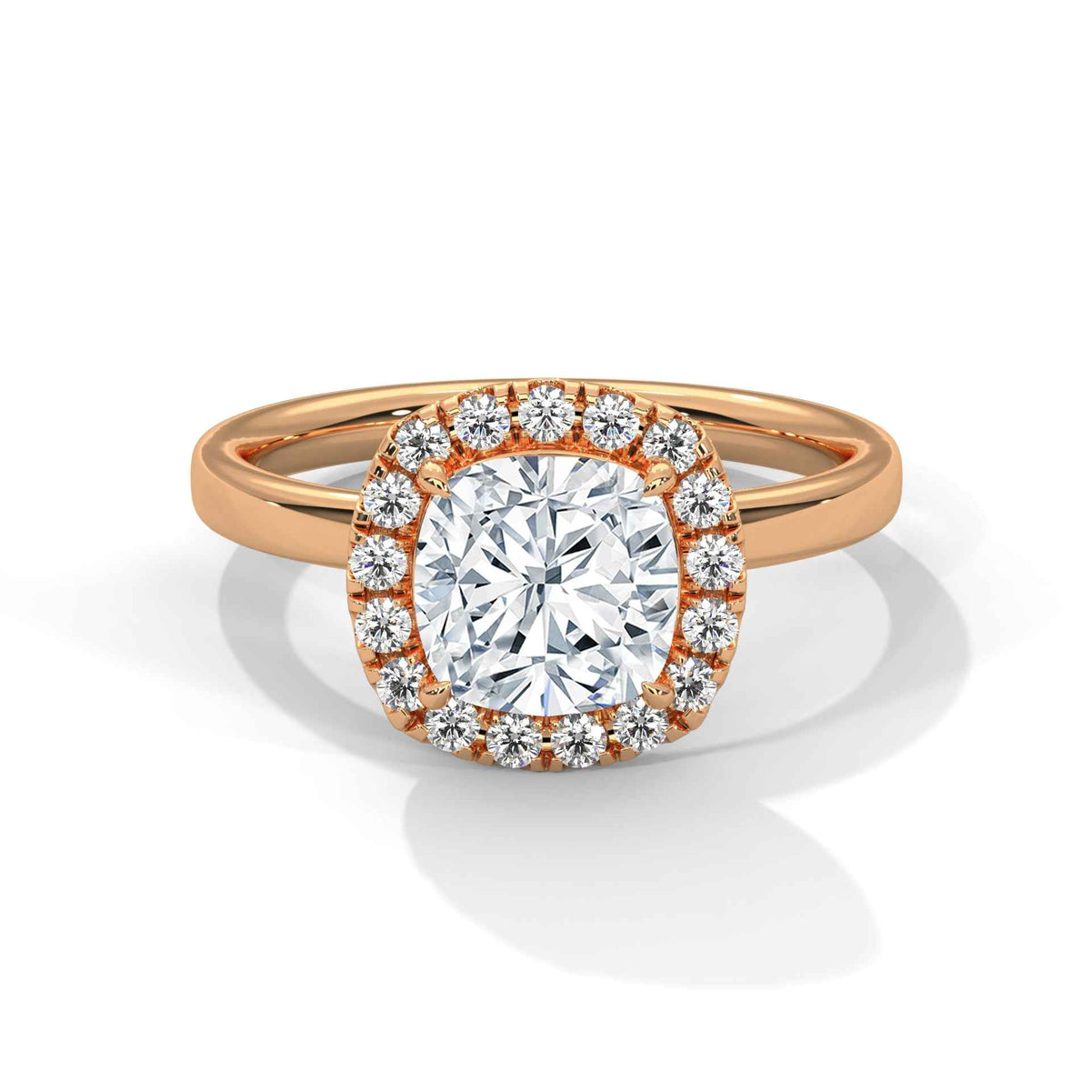 Rose gold ring with a large diamond and smaller diamonds around on a white background