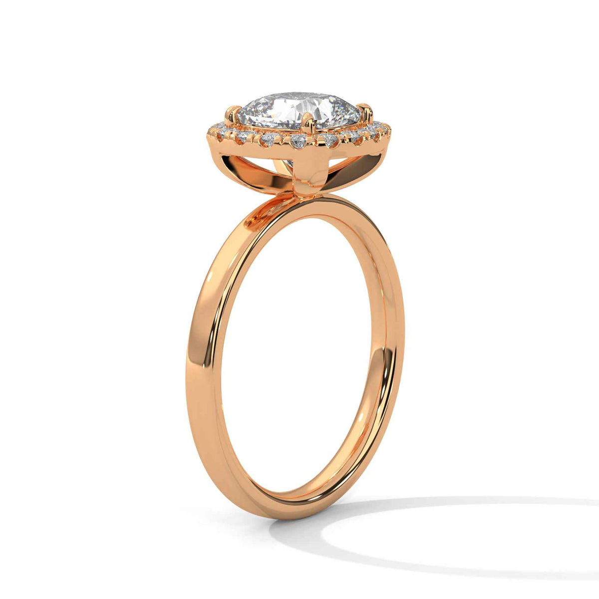Rose gold ring with a diamond on a white background