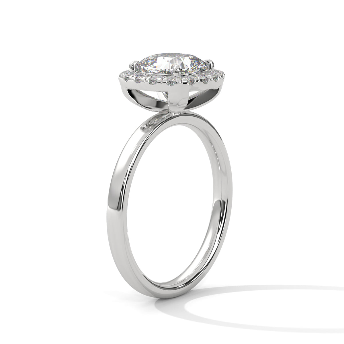 Silver ring with a large diamond on a white background
