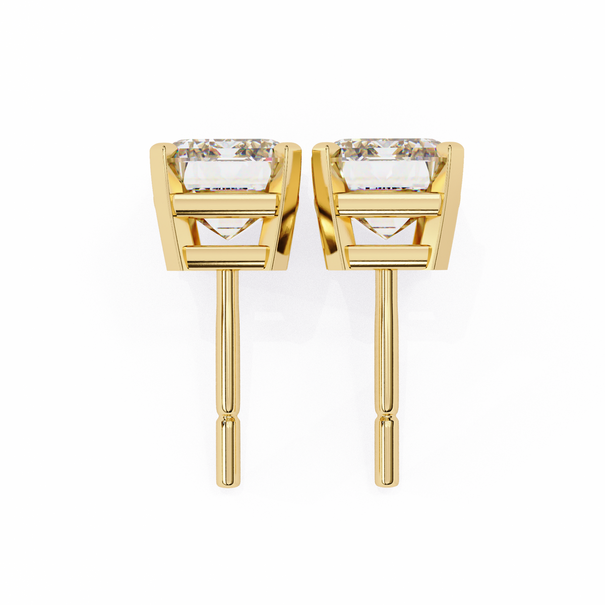 Gold earrings with clear gemstones on a white background