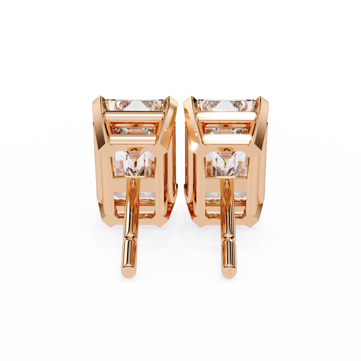 Rose gold hoop earrings with clear gemstones on a white background