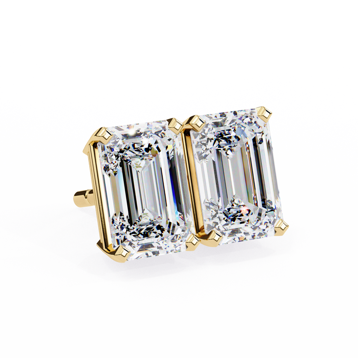 Gold earring with emerald-cut diamonds on a white background