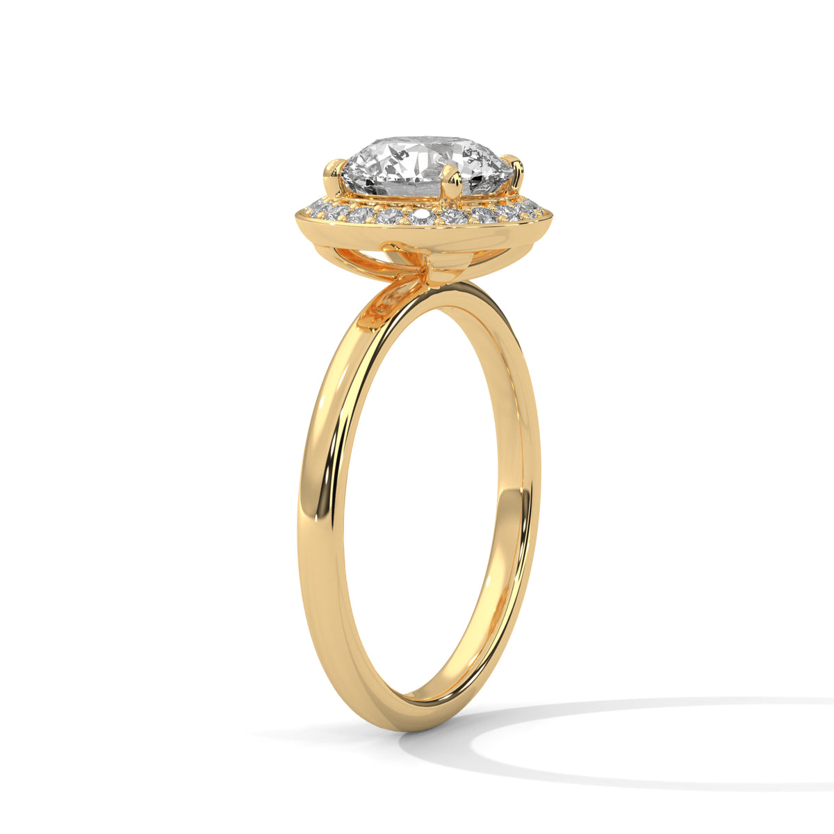 Gold ring with a diamond on a white background