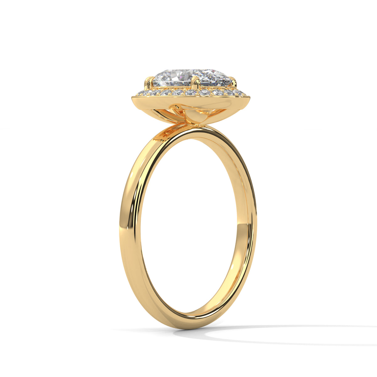 Gold ring with a diamond on a white background