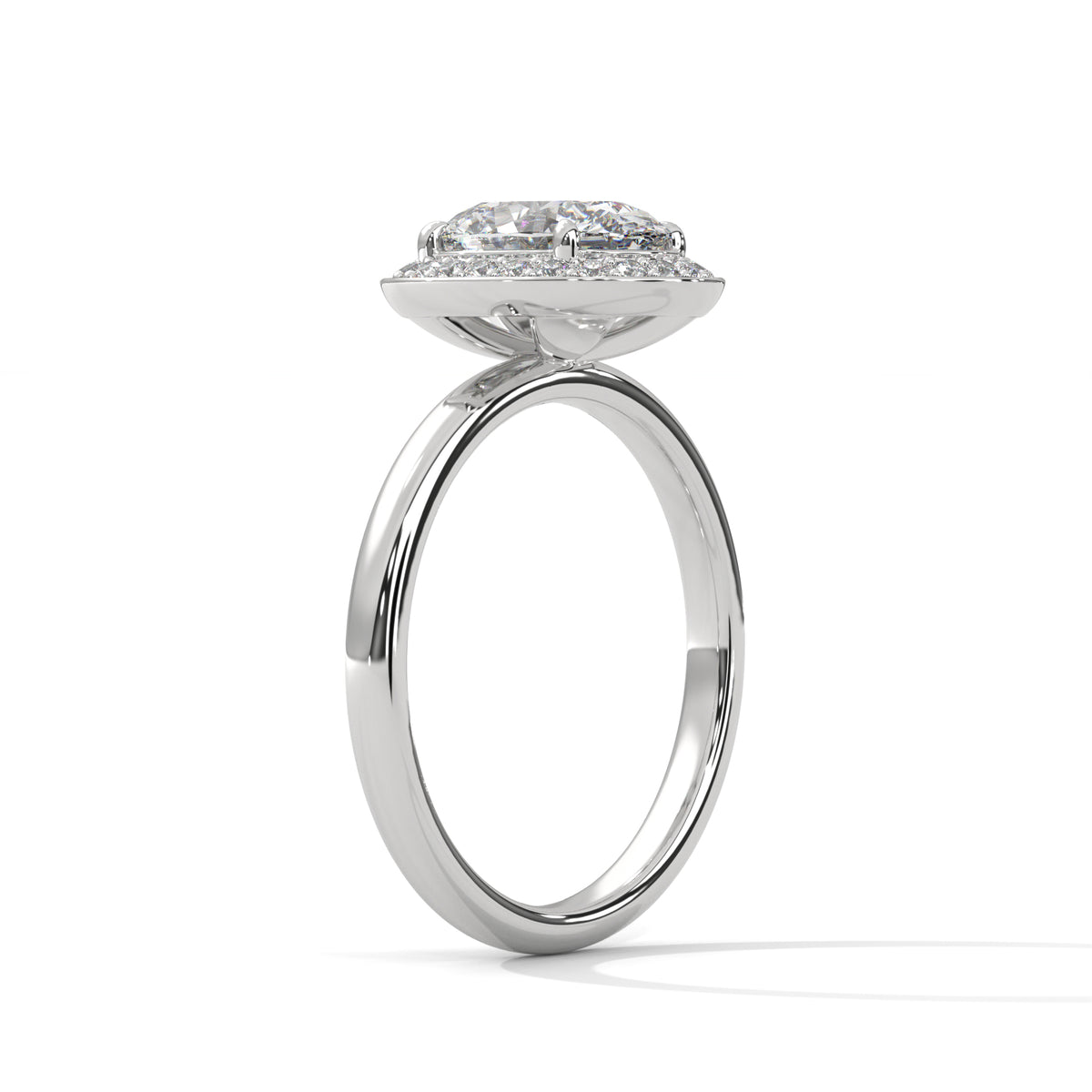 Diamond ring with a white gold band on a white background