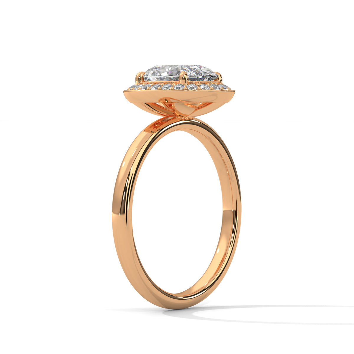 Rose gold ring with a diamond on a white background