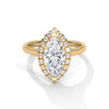 Gold ring with a large diamond and smaller diamonds around on a white background