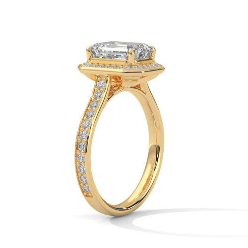 Gold ring with a diamond on a white background
