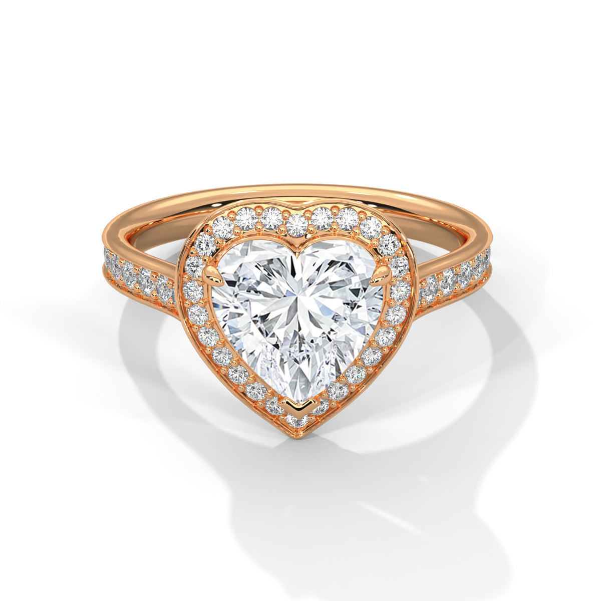 Heart-shaped diamond ring with rose gold band on a white background