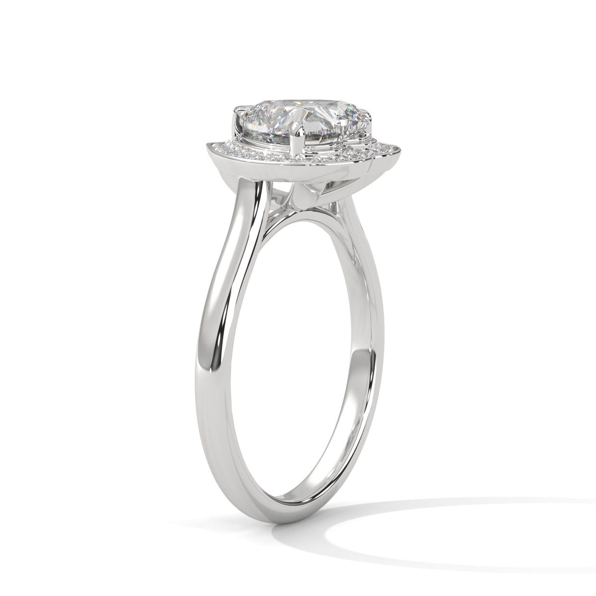 Diamond ring with a white gold band on a white background