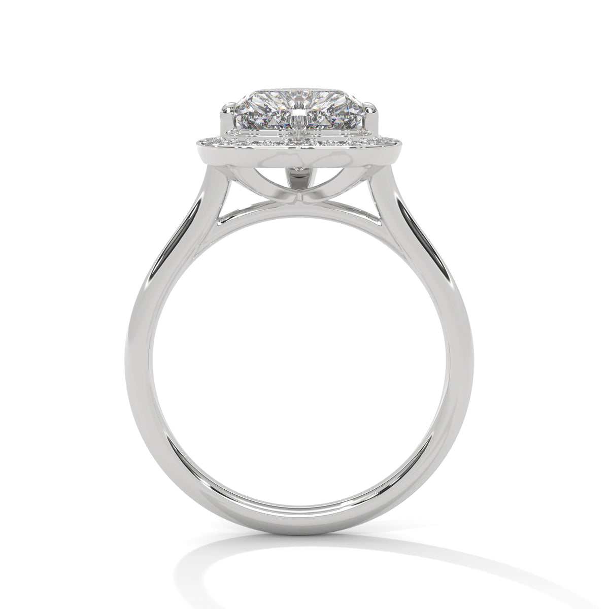 Diamond ring with a hexagonal center stone on a white background