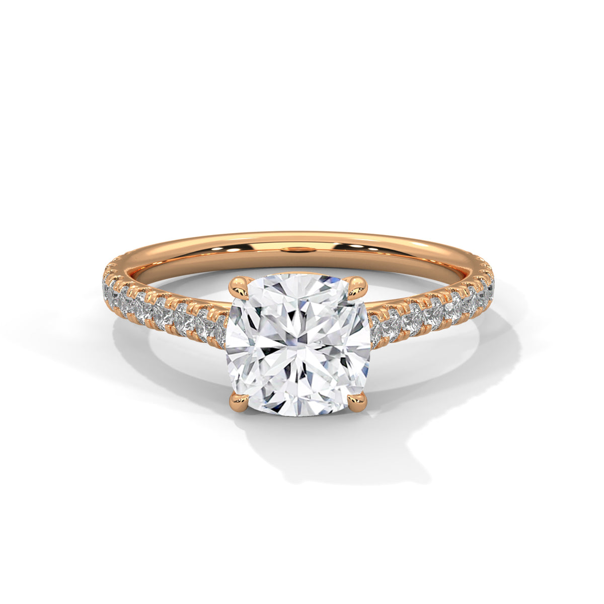 Rose gold ring with a large diamond and smaller diamonds on the band against a white background