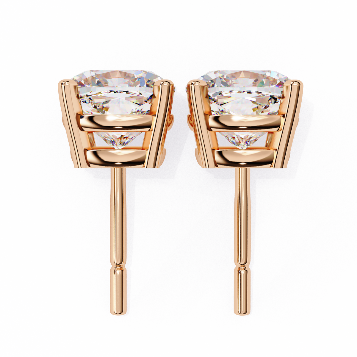 Rose gold stud earrings with clear gemstones on a white background