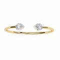 Gold bracelet with two diamond beads on a white background