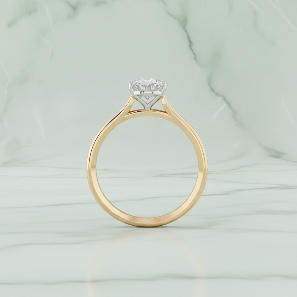 Rose gold ring with a diamond on a white background
