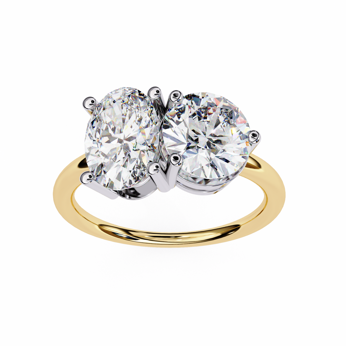 Gold ring with two large diamonds on a white background
