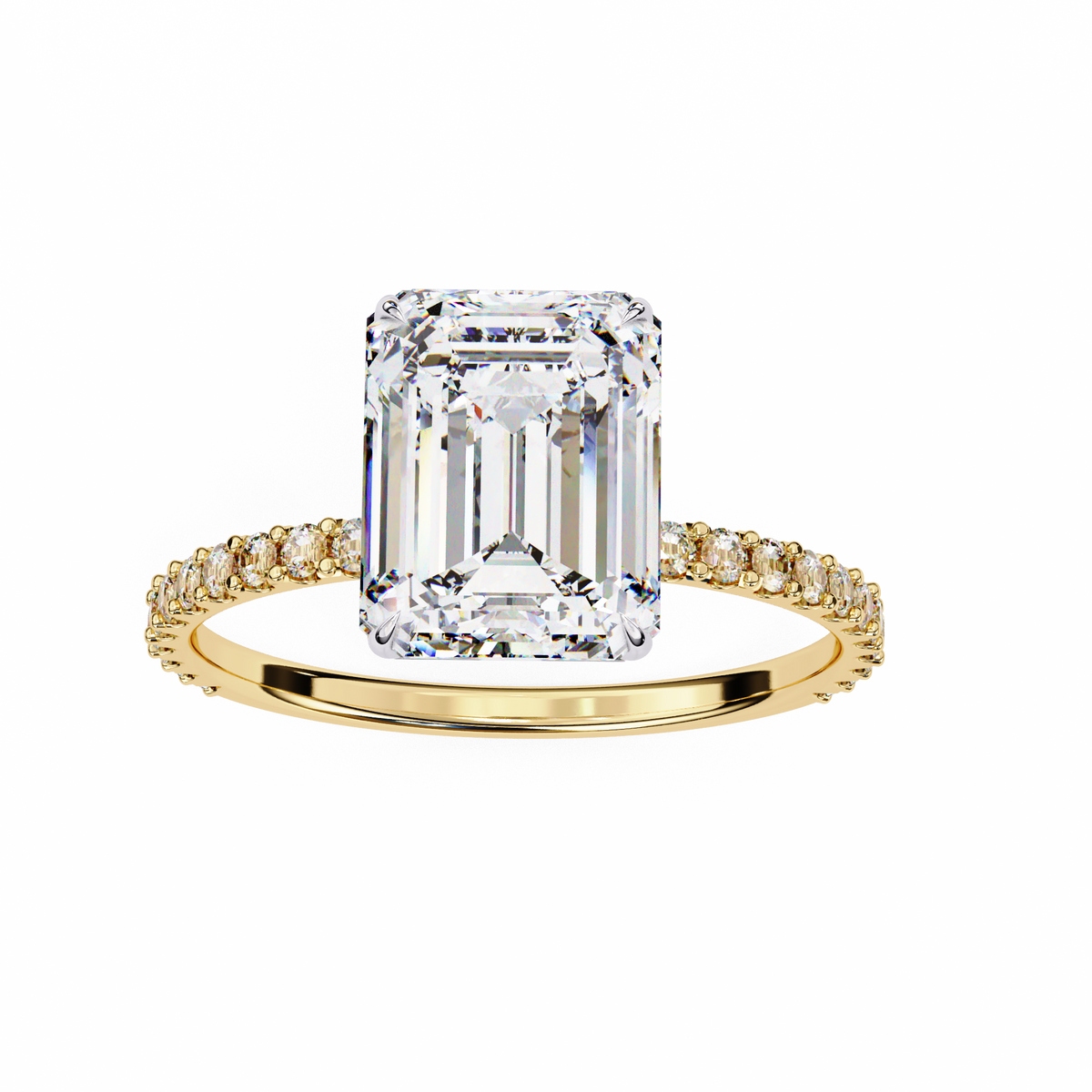 Gold ring with a large emerald-cut diamond and smaller diamonds on the band against a white background