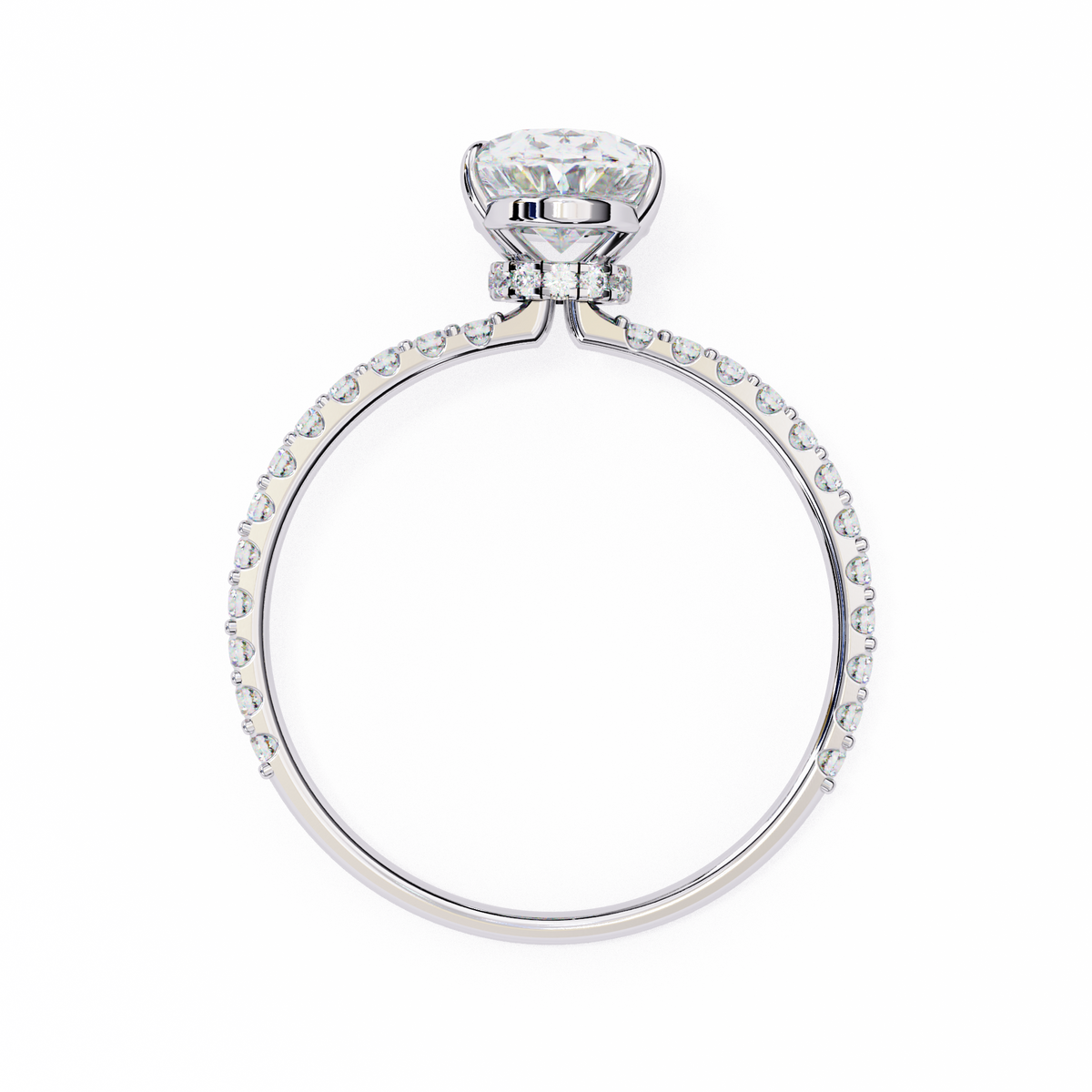 A silver-toned solitaire engagement ring with a round brilliant-cut center stone and a pavé-set band, shown on a plain white background.