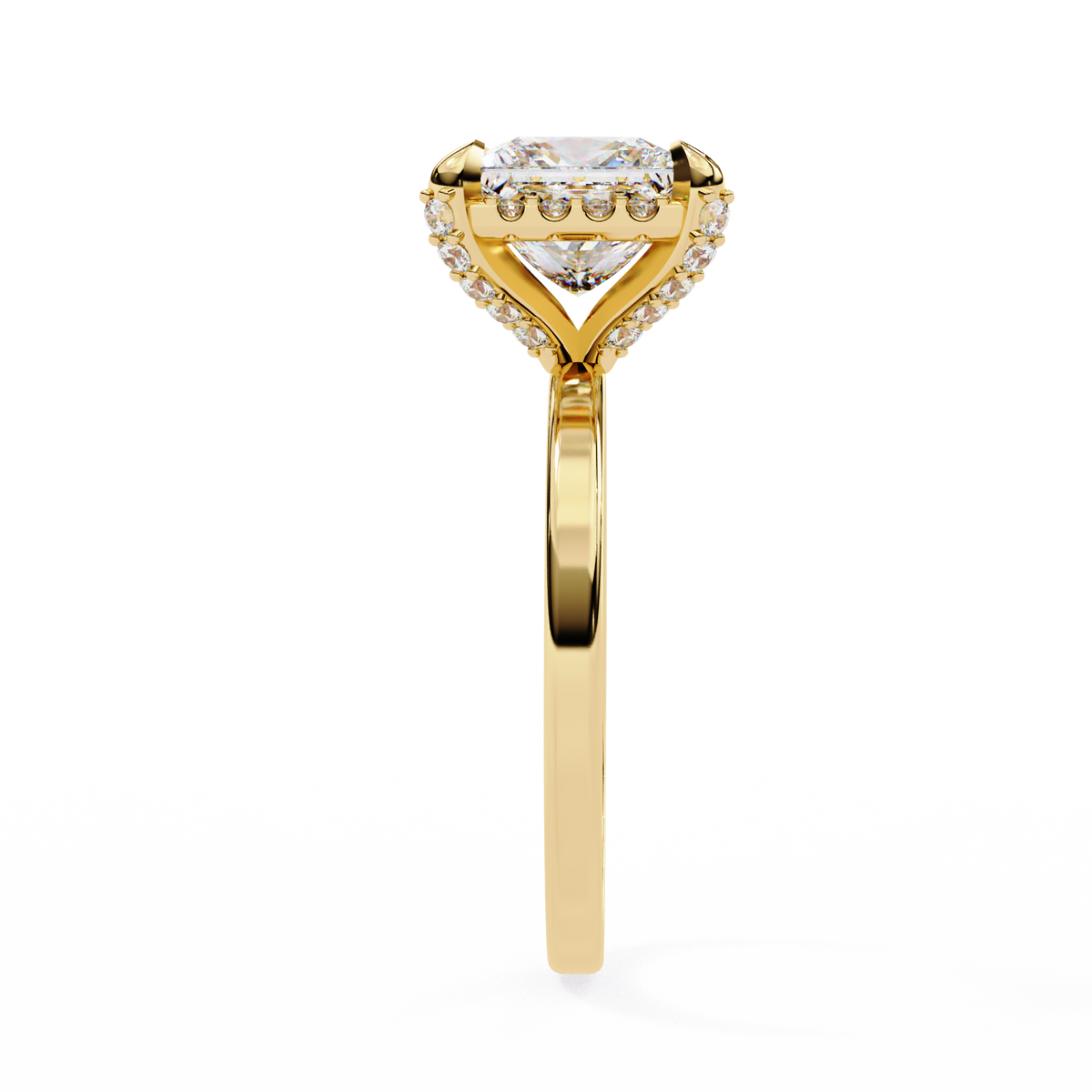 Gold ring with a heart-shaped diamond on a white background