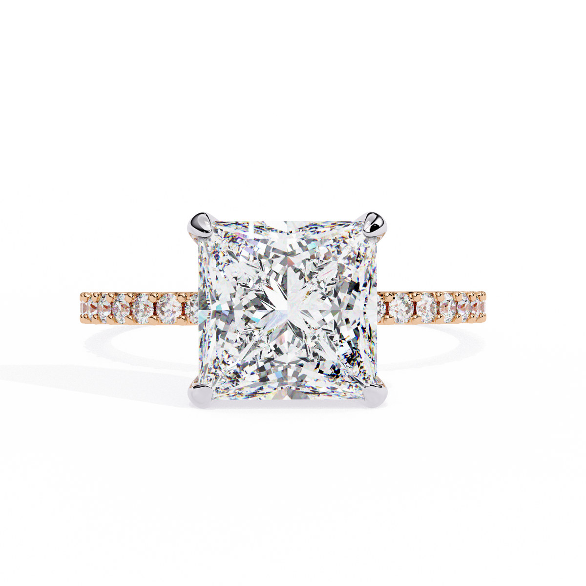 Diamond ring with a square-cut center stone on a white background