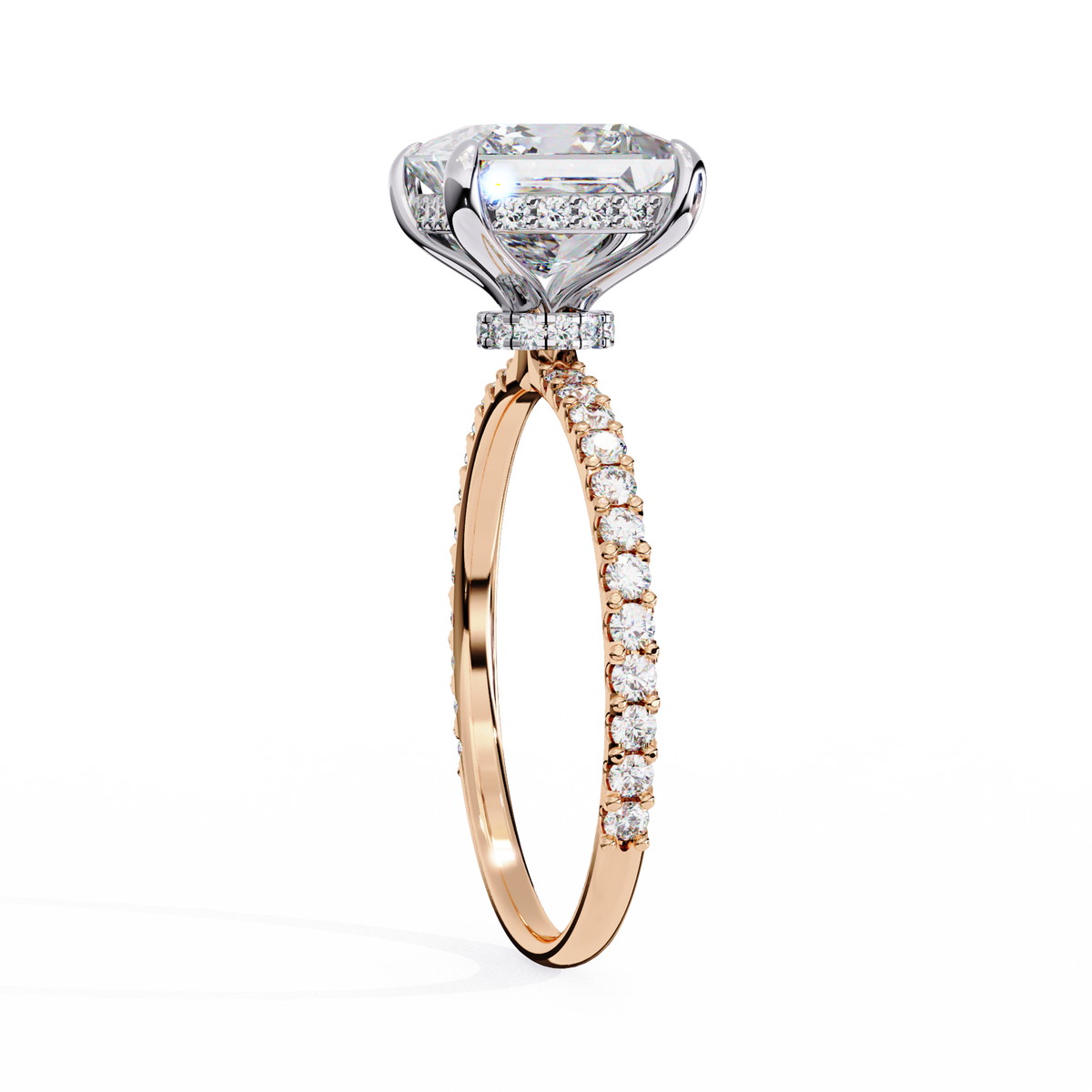 Diamond ring with rose gold band on a white background