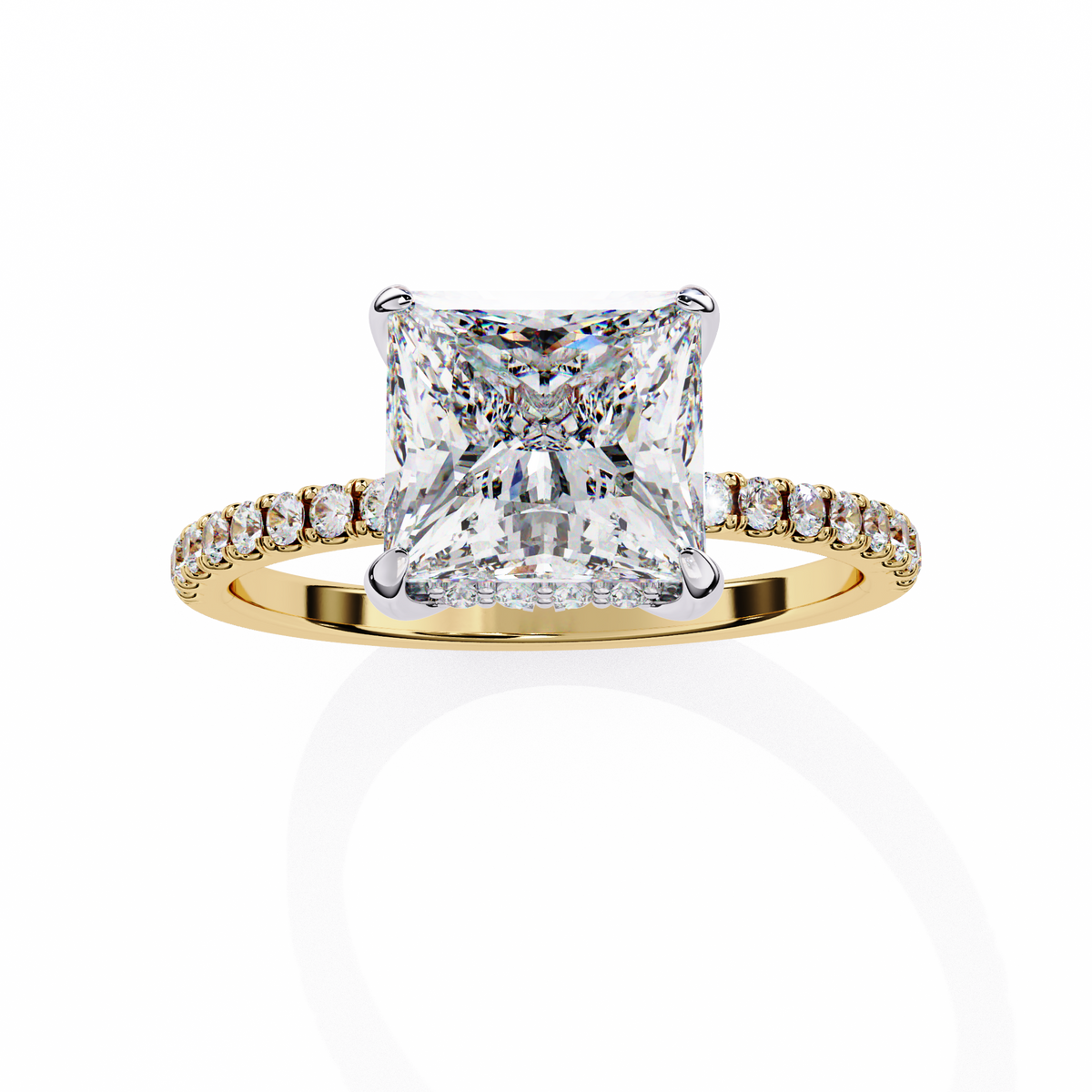 Gold ring with a large diamond and smaller diamonds on the band against a white background