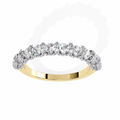 Gold ring with diamond stones on a white background