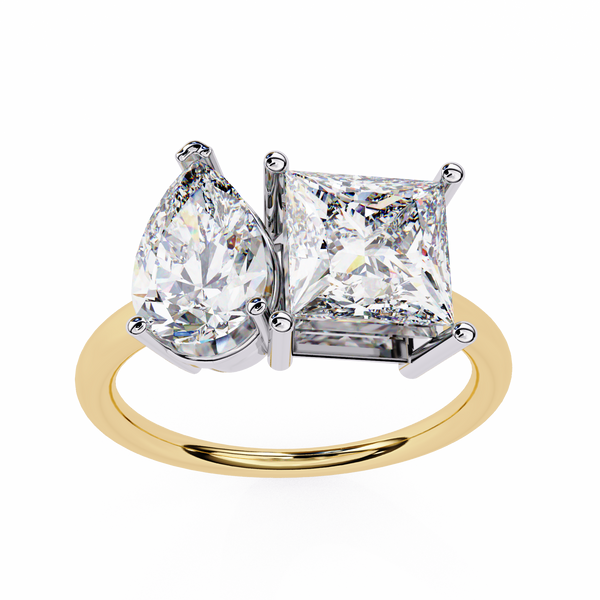 Gold ring with two diamonds on a white background