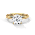 Round Cut Solitaire Engagement Ring with Four-Prong Setting