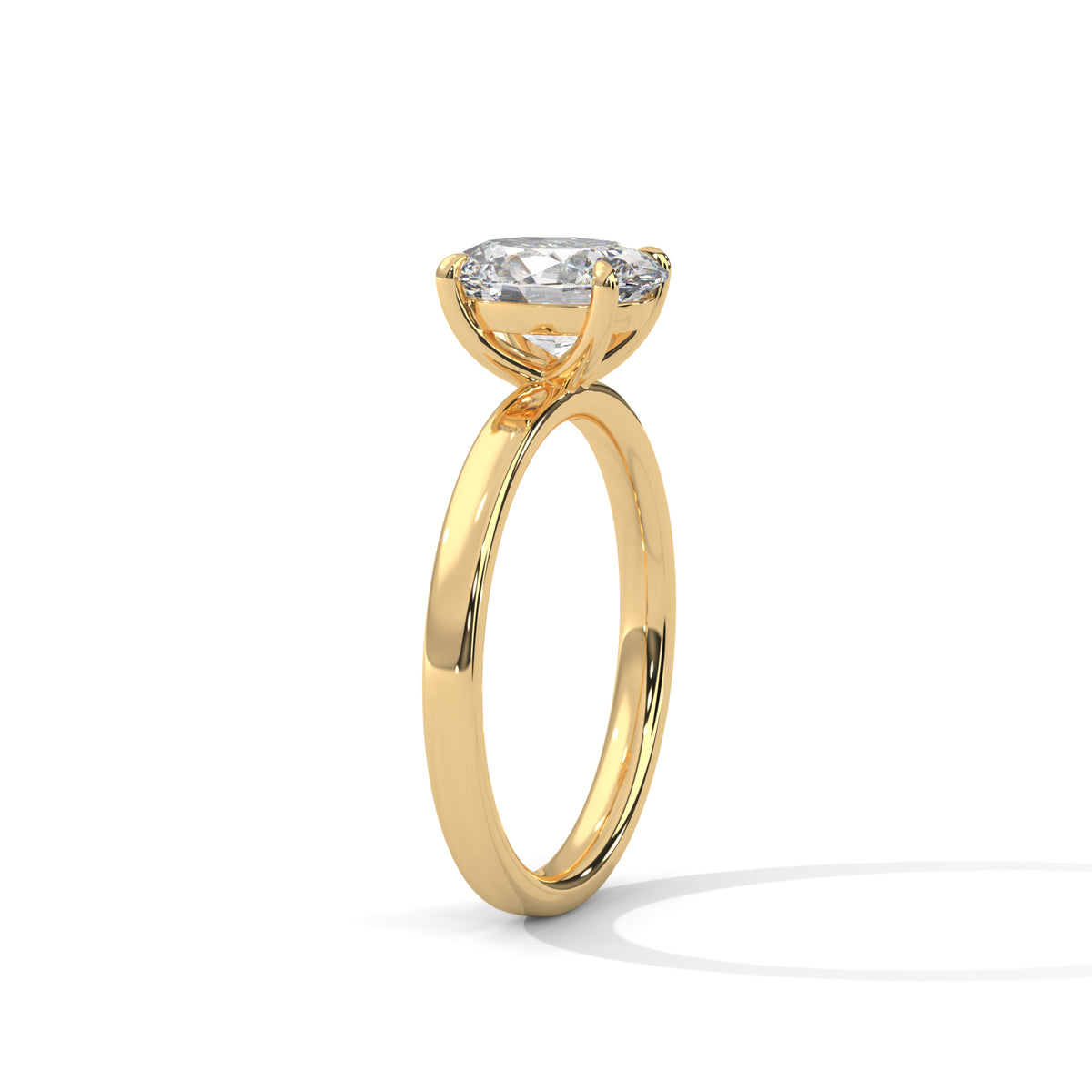 Gold ring with a diamond on a white background