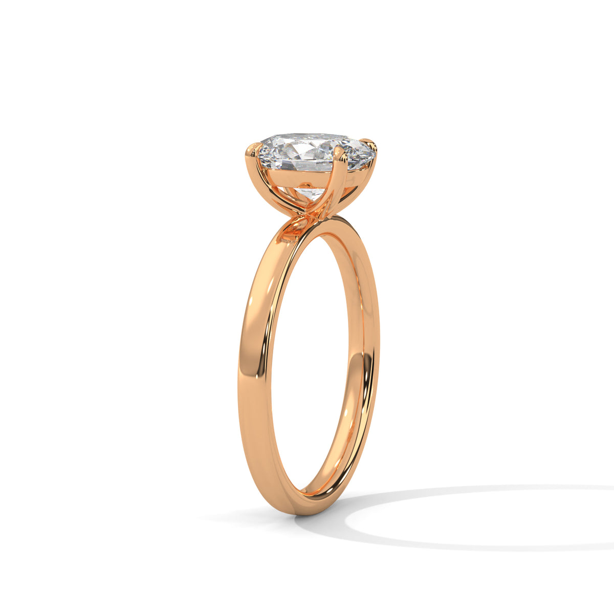 Rose gold ring with a diamond on a white background